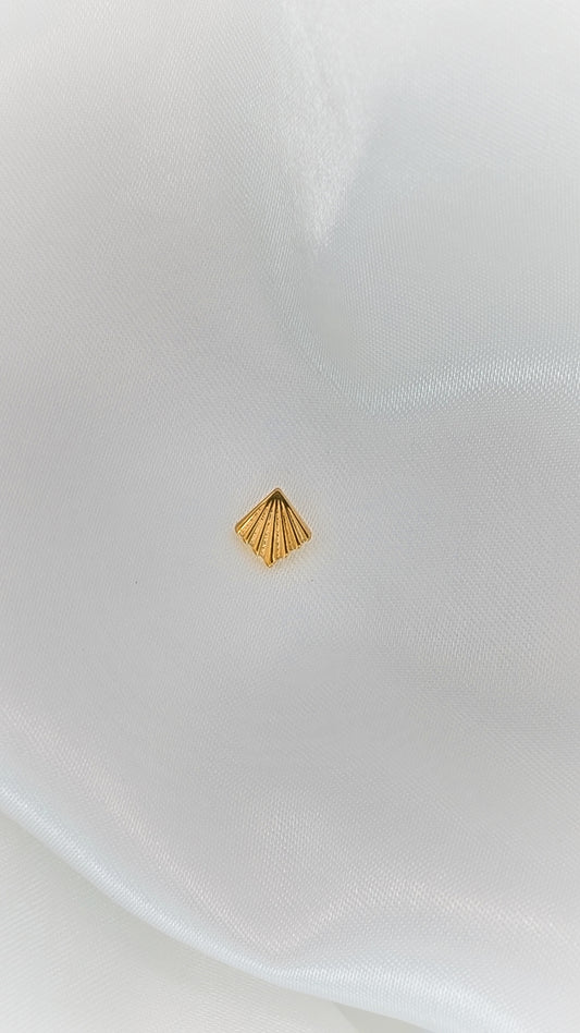 Golden Conch Shell Piercing